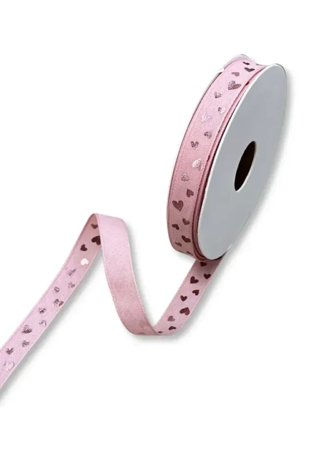 Nastro in tessuto rosa con stampa cuoricini